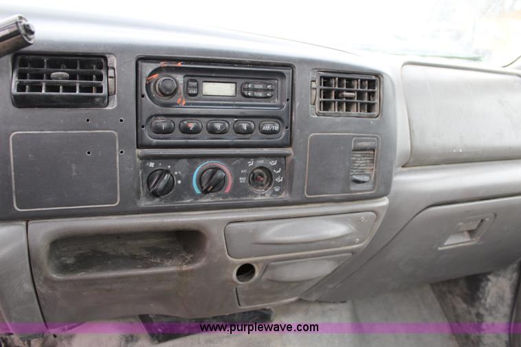 image for item L2350 1999 Ford F350 Super Duty flatbed pickup truck