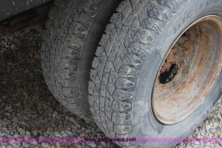 image for item L2350 1999 Ford F350 Super Duty flatbed pickup truck