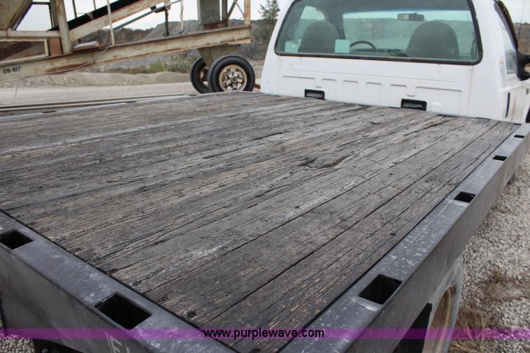 image for item L2350 1999 Ford F350 Super Duty flatbed pickup truck
