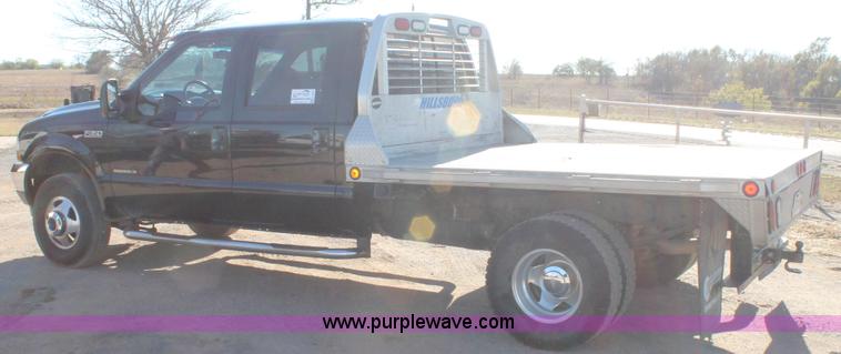image for item L4473 2002 Ford F350 Lariat SuperCrew flatbed pickup truck