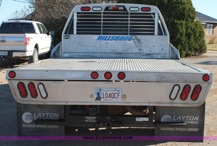 image for item L4473 2002 Ford F350 Lariat SuperCrew flatbed pickup truck