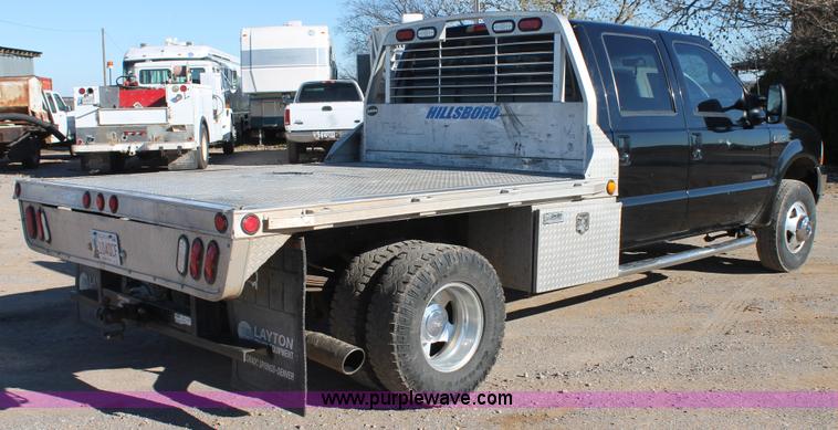 image for item L4473 2002 Ford F350 Lariat SuperCrew flatbed pickup truck