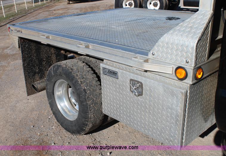 image for item L4473 2002 Ford F350 Lariat SuperCrew flatbed pickup truck