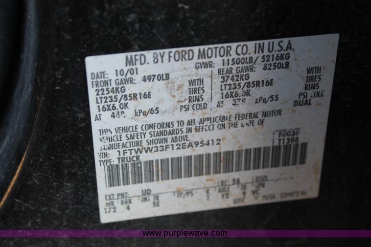 image for item L4473 2002 Ford F350 Lariat SuperCrew flatbed pickup truck