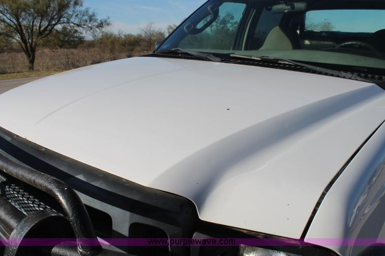 image for item L4474 2006 Ford F350 SuperCrew flatbed pickup truck