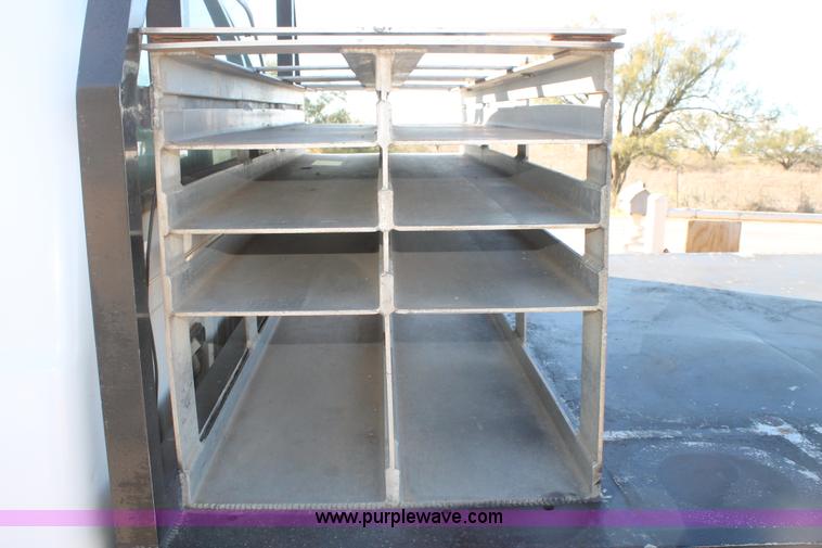 image for item L4474 2006 Ford F350 SuperCrew flatbed pickup truck