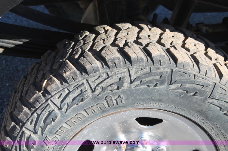 image for item L4474 2006 Ford F350 SuperCrew flatbed pickup truck