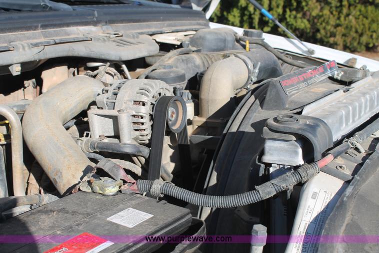 image for item L4474 2006 Ford F350 SuperCrew flatbed pickup truck