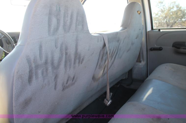 image for item L4474 2006 Ford F350 SuperCrew flatbed pickup truck