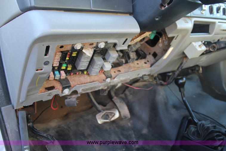 image for item L4474 2006 Ford F350 SuperCrew flatbed pickup truck