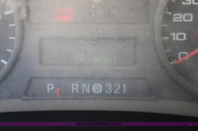 image for item L4474 2006 Ford F350 SuperCrew flatbed pickup truck