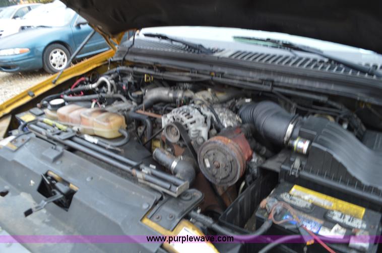 image for item L4546 2001 Ford F350 Super Duty Crew Cab flatbed pickup truck