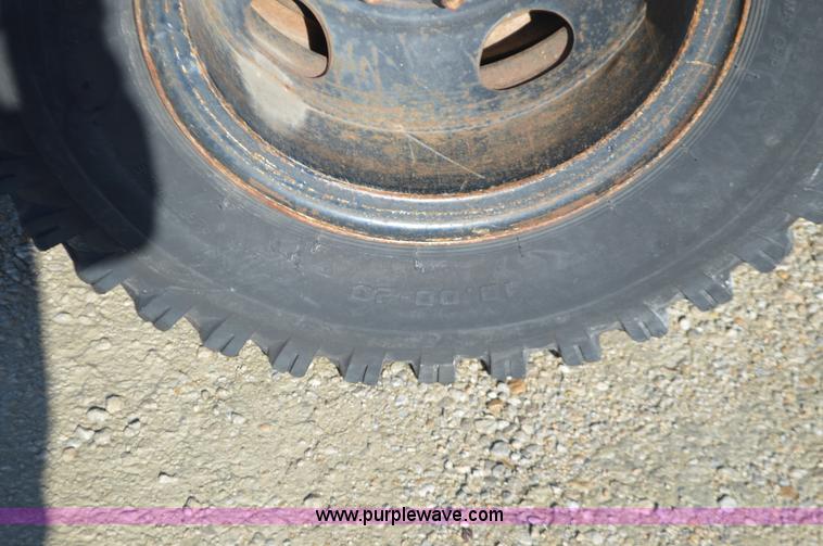 image for item L4636 1984 Ford F700 roofing conveyor truck