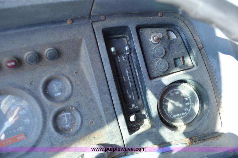 image for item L4636 1984 Ford F700 roofing conveyor truck