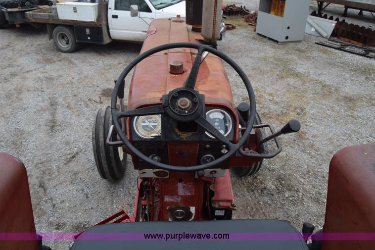 image for item L1025 International Farmall 1256 tractor