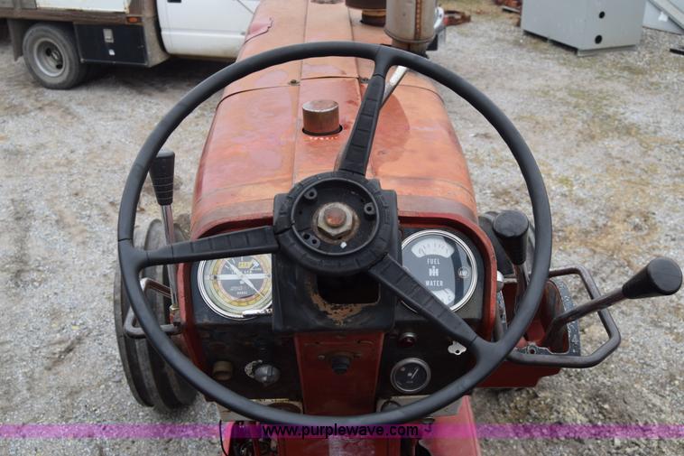 image for item L1025 International Farmall 1256 tractor