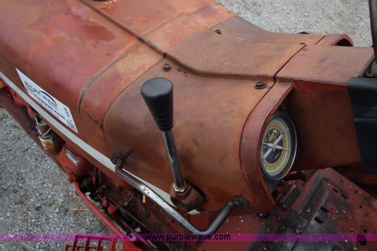 image for item L1025 International Farmall 1256 tractor