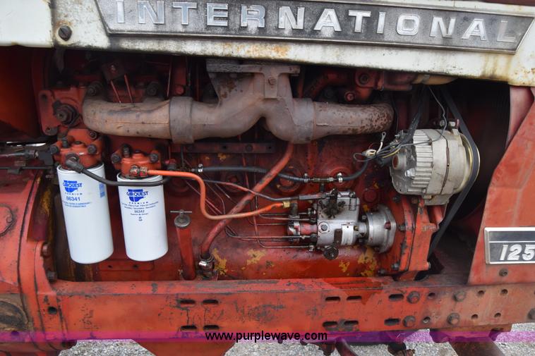 image for item L1025 International Farmall 1256 tractor
