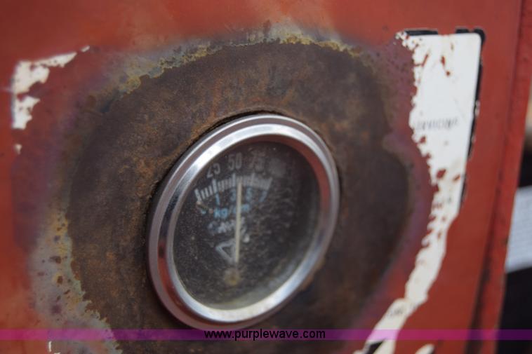 image for item L1025 International Farmall 1256 tractor