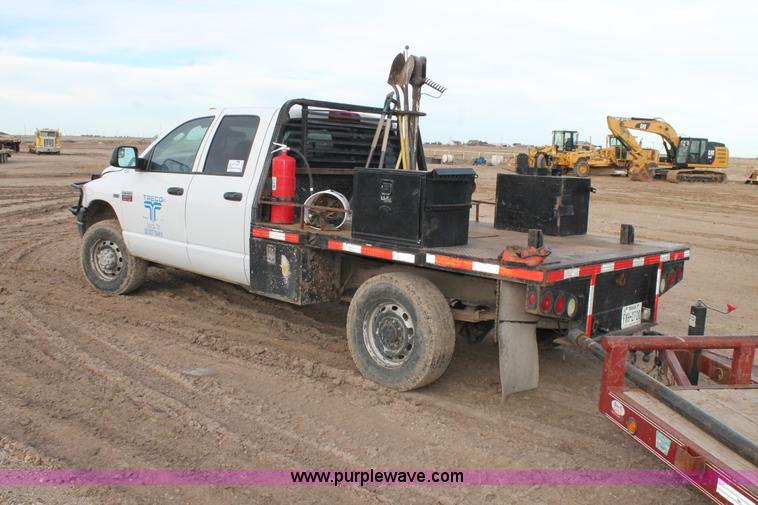 image for item J1342 2008 Dodge Ram 2500HD Quad Cab flatbed pickup truck