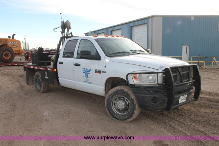 image for item J1342 2008 Dodge Ram 2500HD Quad Cab flatbed pickup truck
