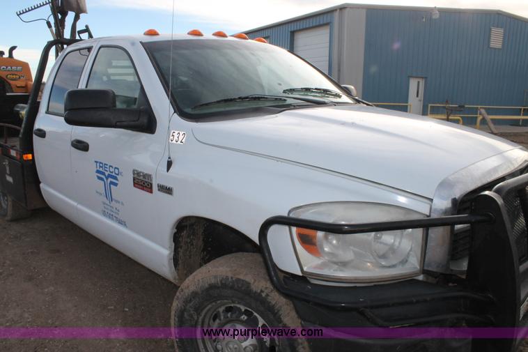 image for item J1342 2008 Dodge Ram 2500HD Quad Cab flatbed pickup truck