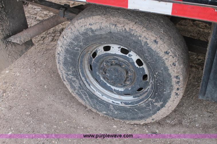 image for item J1342 2008 Dodge Ram 2500HD Quad Cab flatbed pickup truck