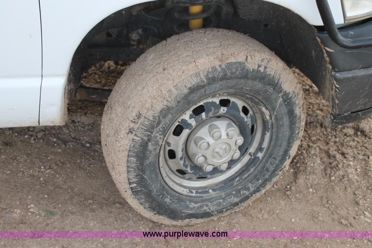 image for item J1342 2008 Dodge Ram 2500HD Quad Cab flatbed pickup truck