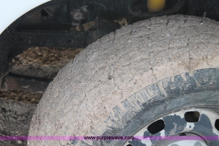 image for item J1342 2008 Dodge Ram 2500HD Quad Cab flatbed pickup truck