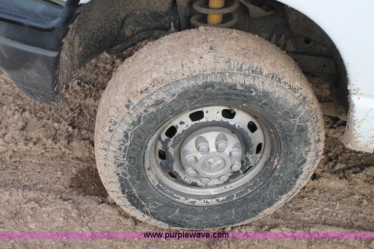 image for item J1342 2008 Dodge Ram 2500HD Quad Cab flatbed pickup truck