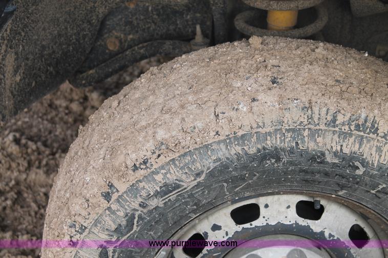 image for item J1342 2008 Dodge Ram 2500HD Quad Cab flatbed pickup truck