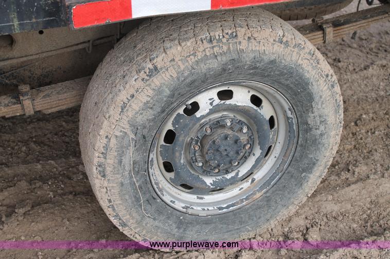 image for item J1342 2008 Dodge Ram 2500HD Quad Cab flatbed pickup truck