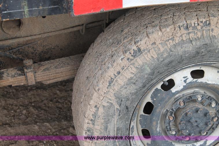 image for item J1342 2008 Dodge Ram 2500HD Quad Cab flatbed pickup truck