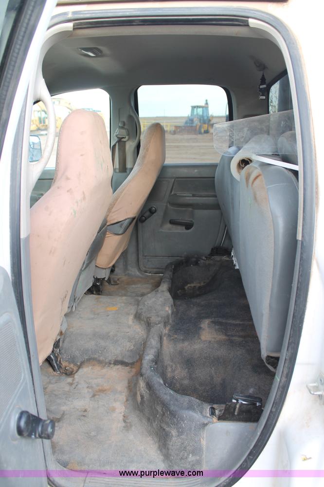 image for item J1342 2008 Dodge Ram 2500HD Quad Cab flatbed pickup truck