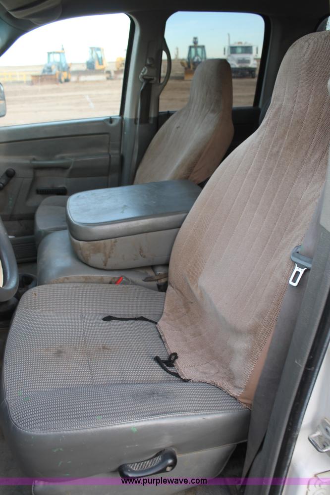 image for item J1342 2008 Dodge Ram 2500HD Quad Cab flatbed pickup truck