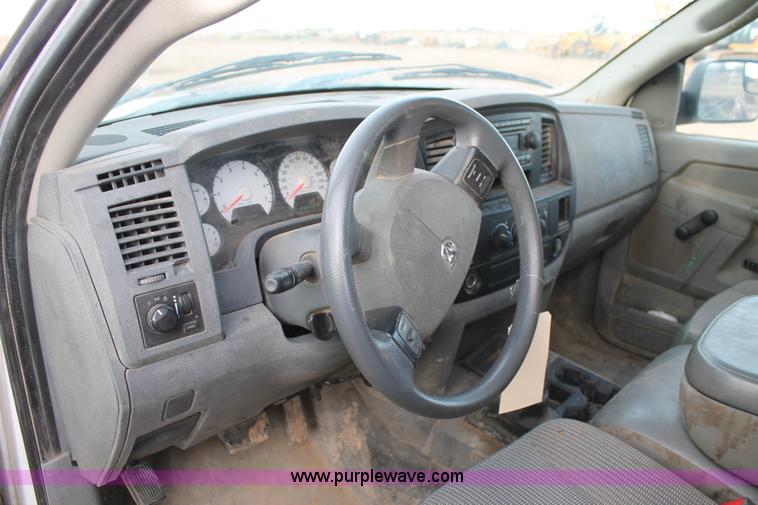 image for item J1342 2008 Dodge Ram 2500HD Quad Cab flatbed pickup truck