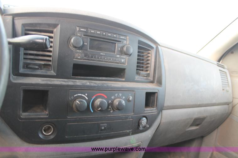 image for item J1342 2008 Dodge Ram 2500HD Quad Cab flatbed pickup truck