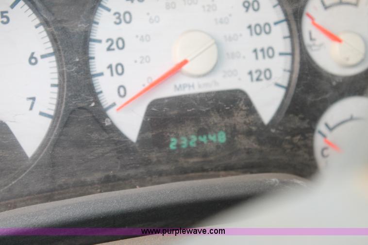 image for item J1342 2008 Dodge Ram 2500HD Quad Cab flatbed pickup truck