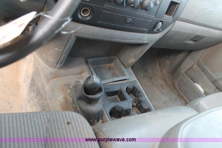 image for item J1342 2008 Dodge Ram 2500HD Quad Cab flatbed pickup truck