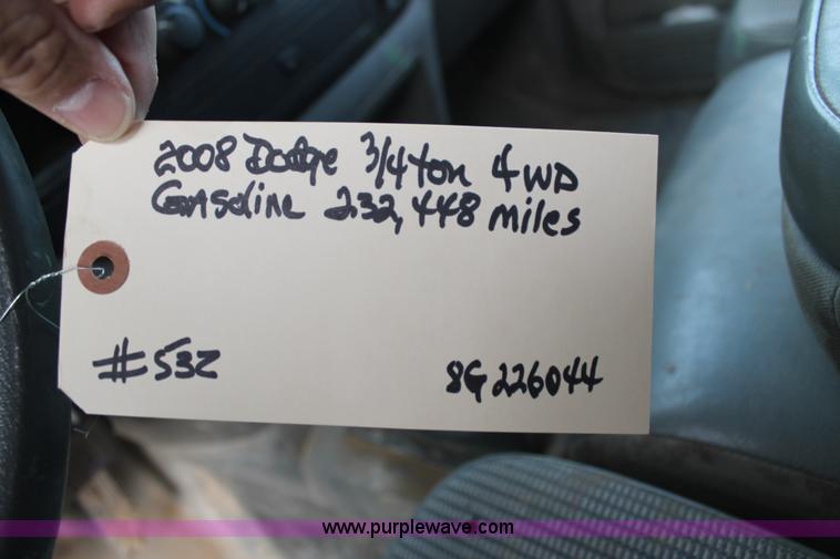 image for item J1342 2008 Dodge Ram 2500HD Quad Cab flatbed pickup truck