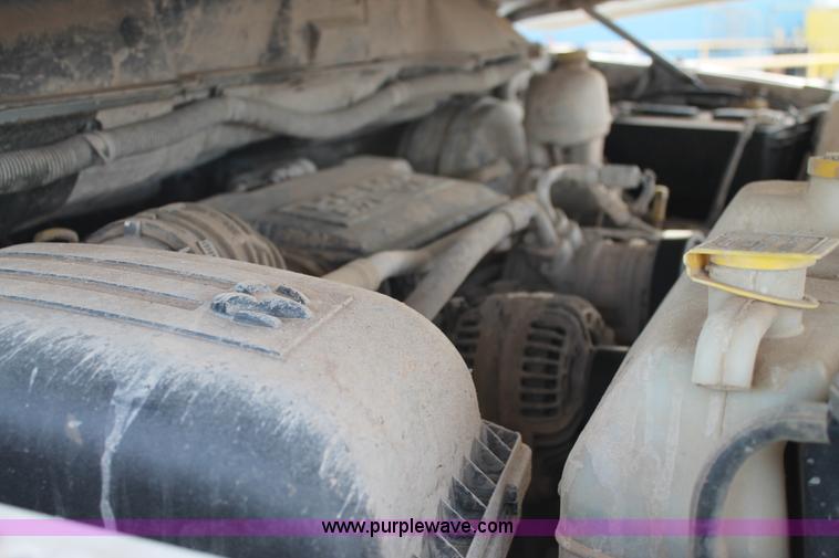 image for item J1342 2008 Dodge Ram 2500HD Quad Cab flatbed pickup truck