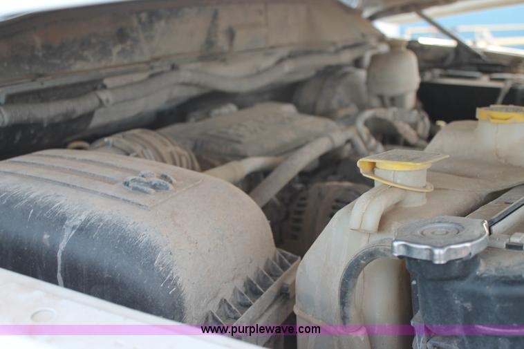 image for item J1342 2008 Dodge Ram 2500HD Quad Cab flatbed pickup truck