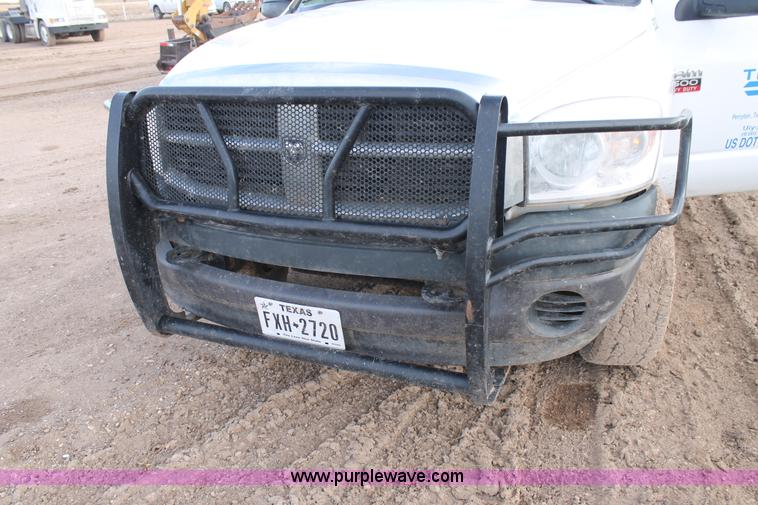image for item J1342 2008 Dodge Ram 2500HD Quad Cab flatbed pickup truck