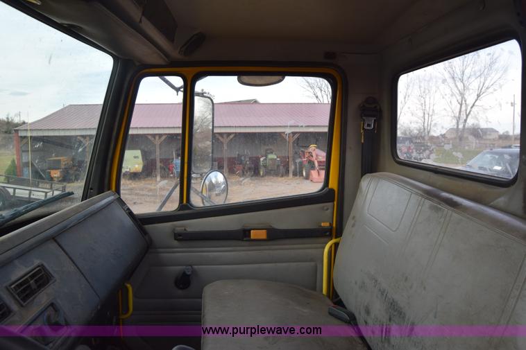 image for item L1006 2001 Freightliner FL70 truck cab and chassis