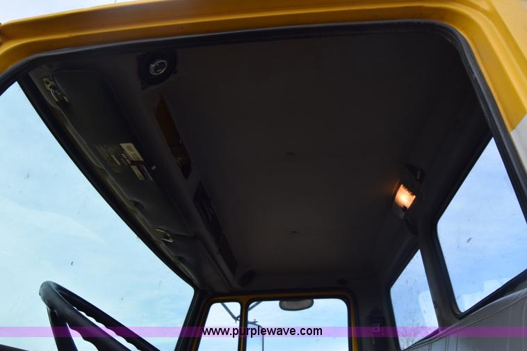 image for item L1006 2001 Freightliner FL70 truck cab and chassis