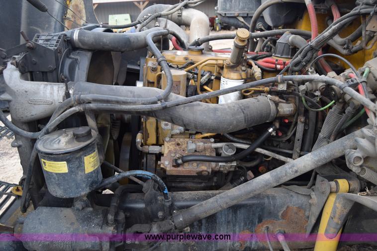 image for item L1006 2001 Freightliner FL70 truck cab and chassis