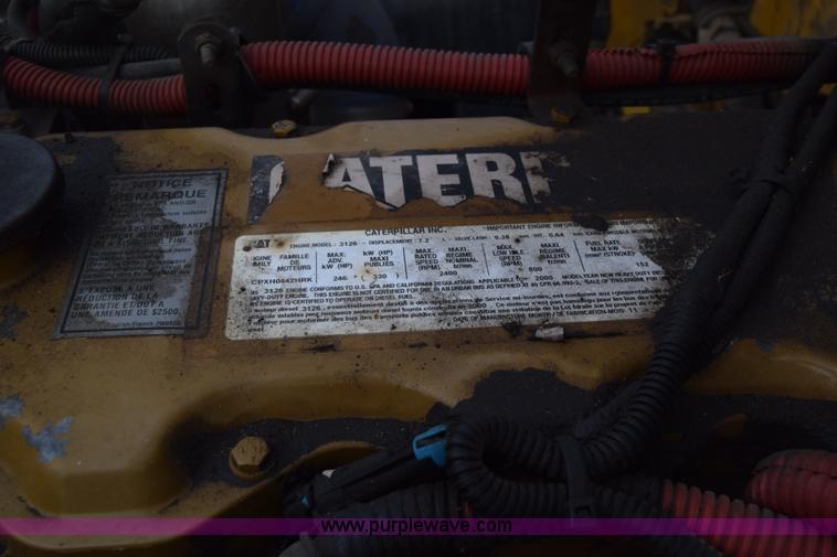 image for item L1006 2001 Freightliner FL70 truck cab and chassis