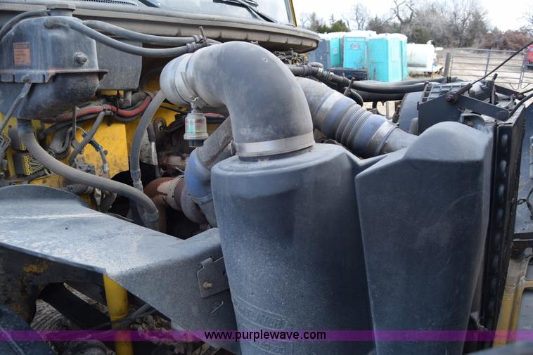 image for item L1006 2001 Freightliner FL70 truck cab and chassis