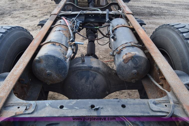 image for item L1006 2001 Freightliner FL70 truck cab and chassis