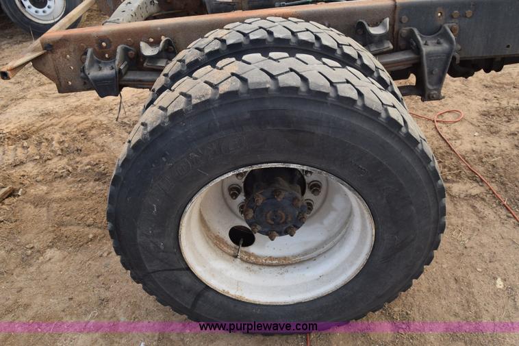 image for item L1006 2001 Freightliner FL70 truck cab and chassis